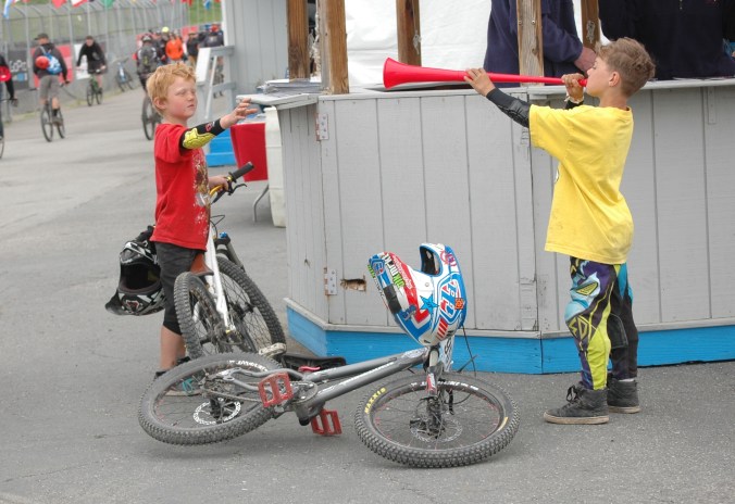 These kids know cycling is all about friends. And vuvuzelas. 